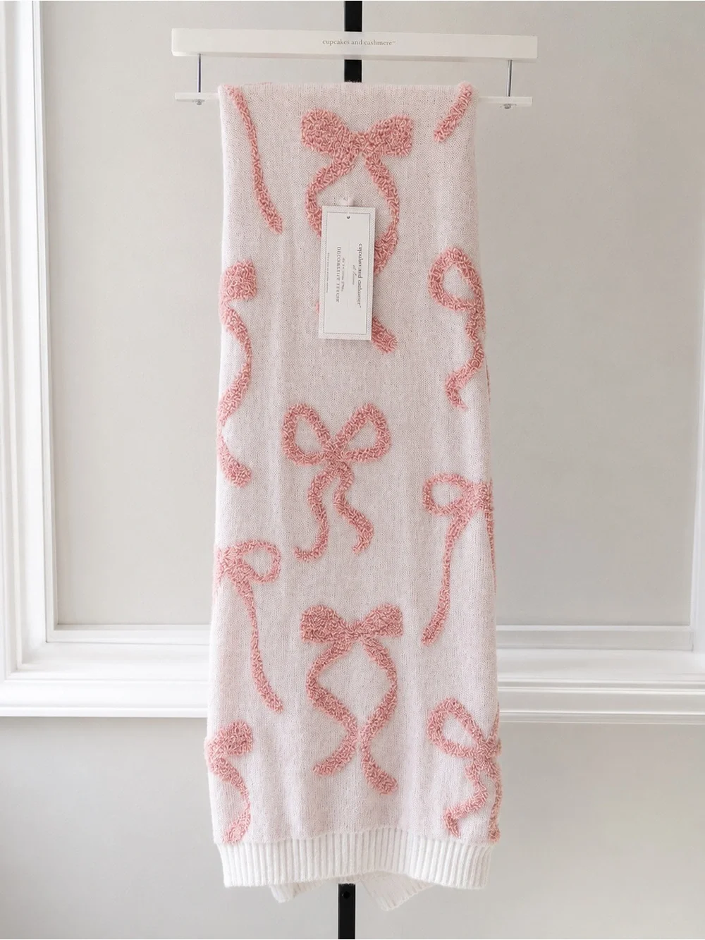 cupcakes & cashmere Pink Bow Motif Decorative Throw